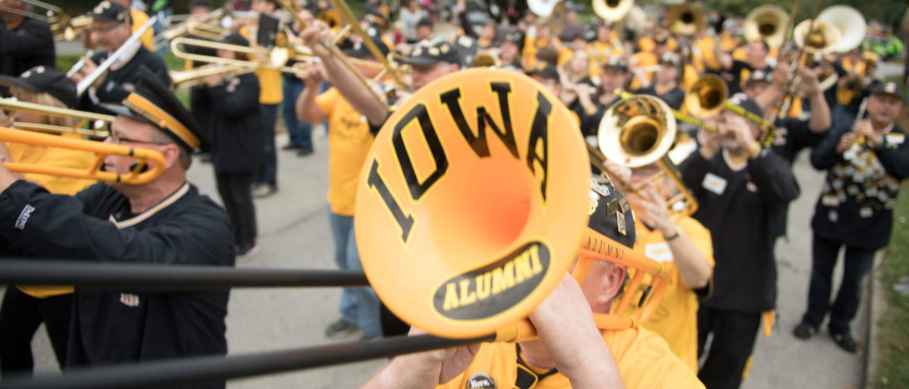 Lots of Iowa pride at the Homecoming Parade thanks to the Alumni band and the Iowa marching band. Copyright 2016. Tim Schoon